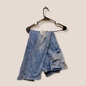 Distressed acid washed jeans